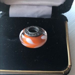 Pandora orange and white charm